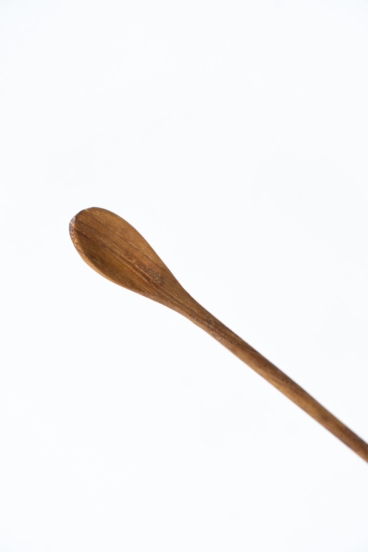 Close-up of the Reclaimed Stirring Spoon by The Loft Selects.