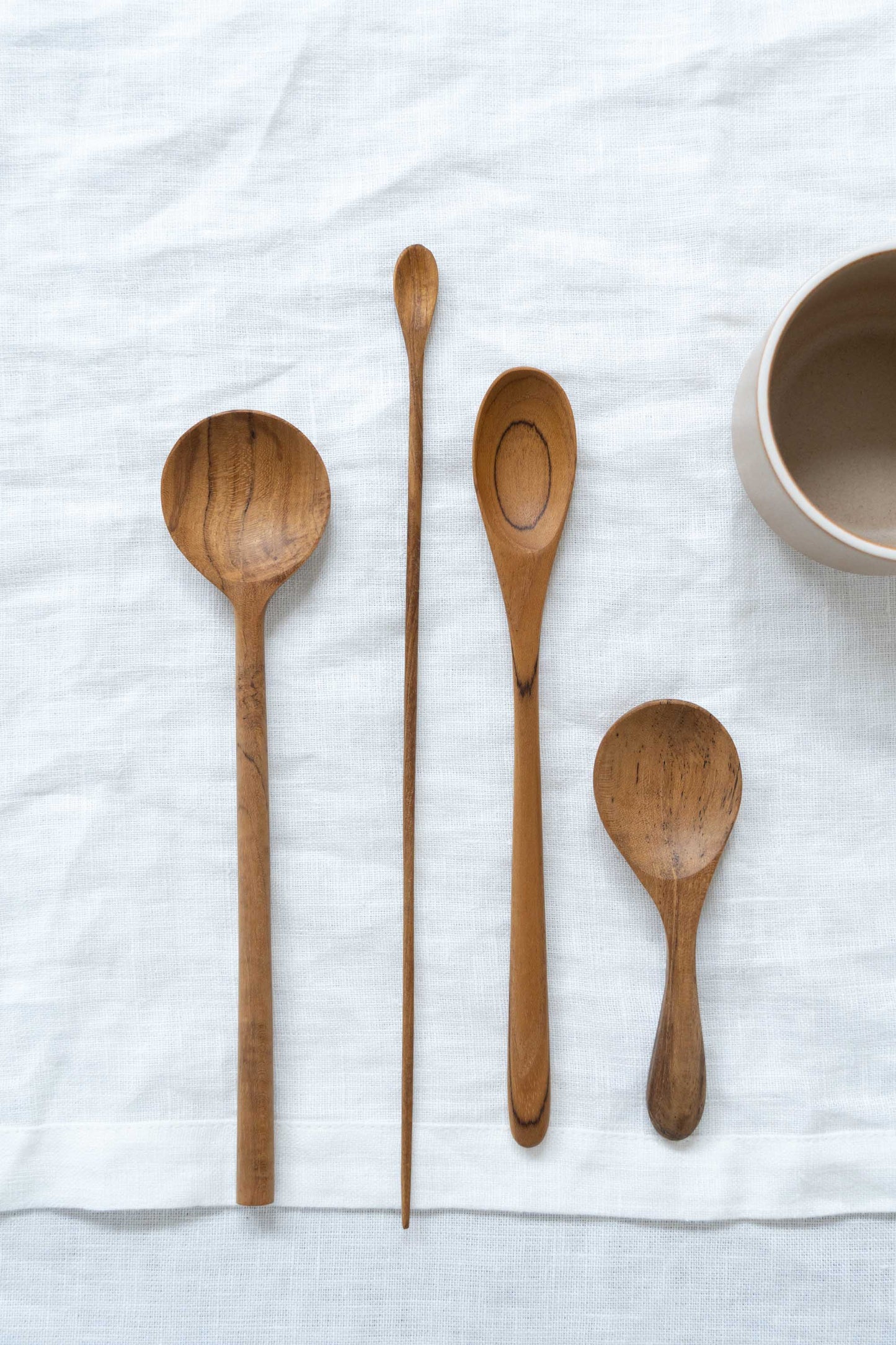 Set of all four reclaimed wooden spoons.