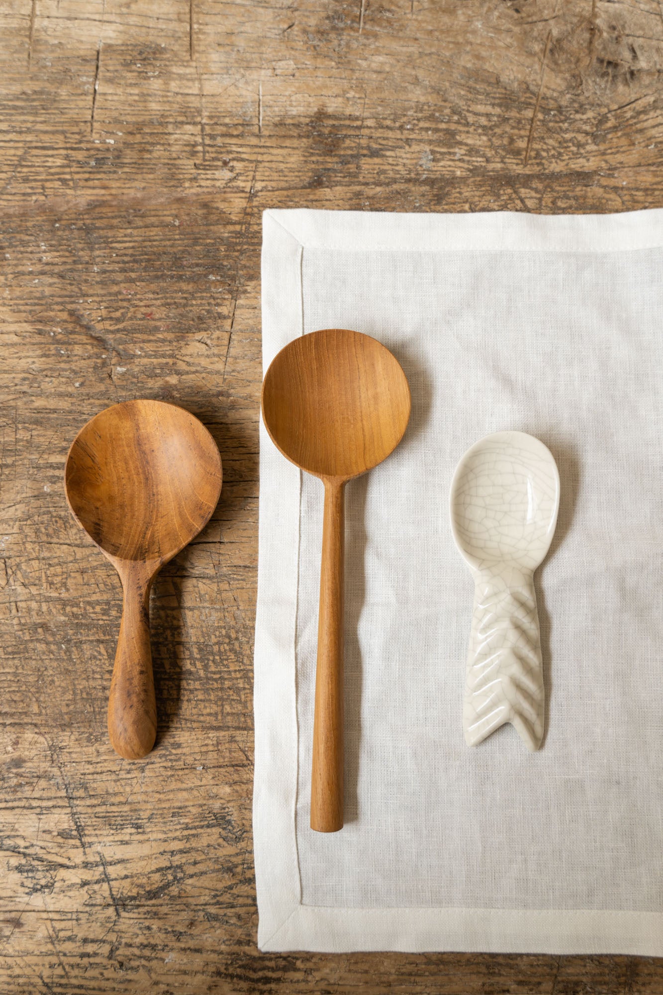 Set of spoons on wooden table