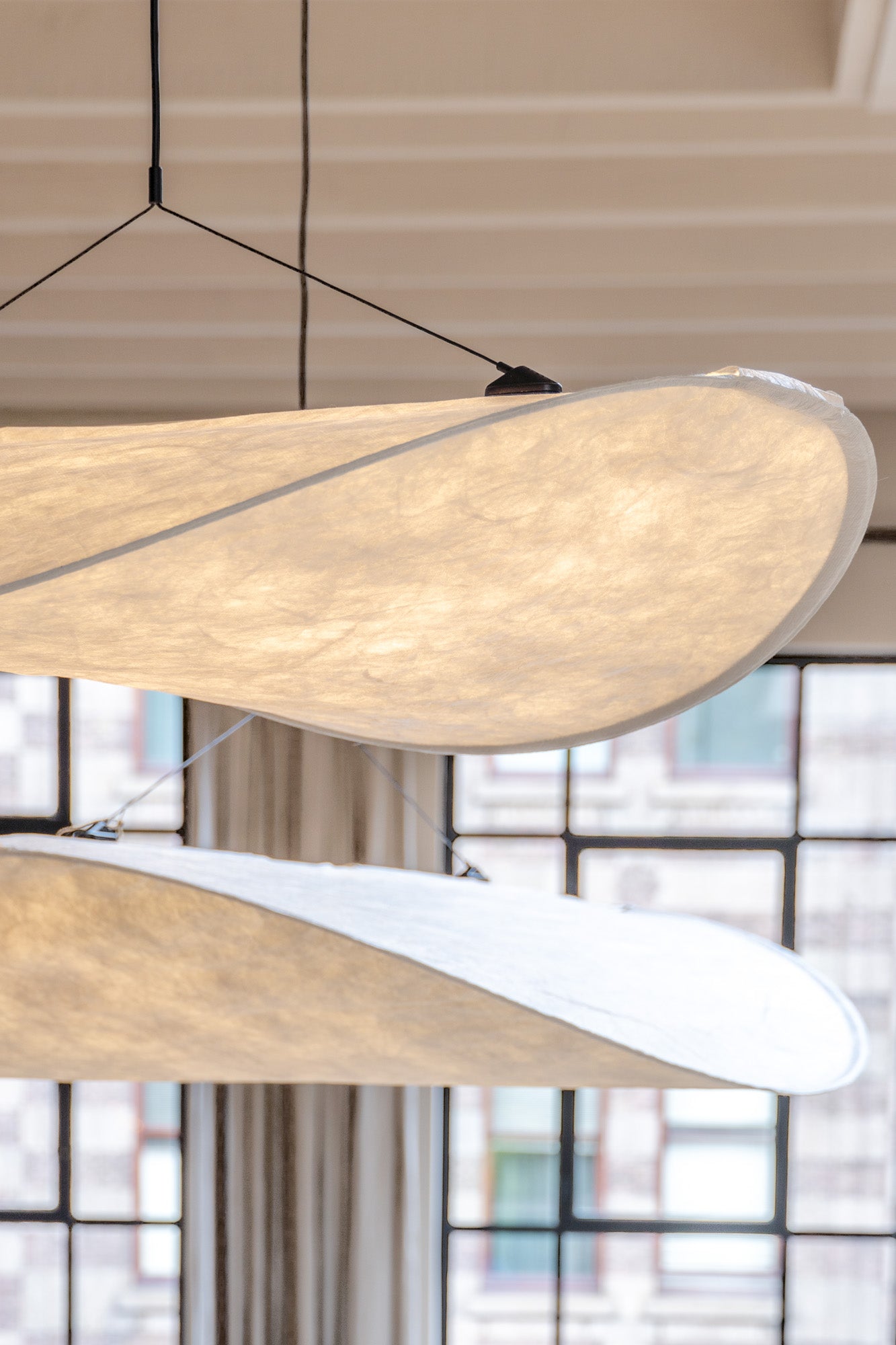 Side view of the Tense Pendant Lamp by New Works.