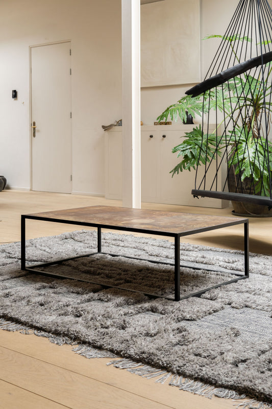 The Mesa Coffee Table by Heerenhuis set in a light interior design at Enter The Loft.