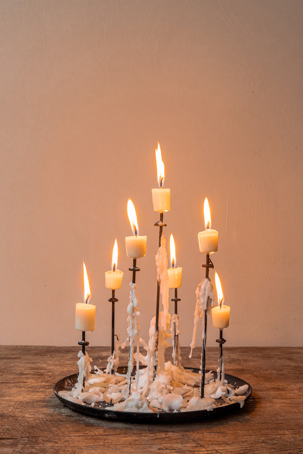 Multi-candle pin in use, elegantly holding multiple candles in a single arrangement. Enhances the visual impact and creates a captivating display.