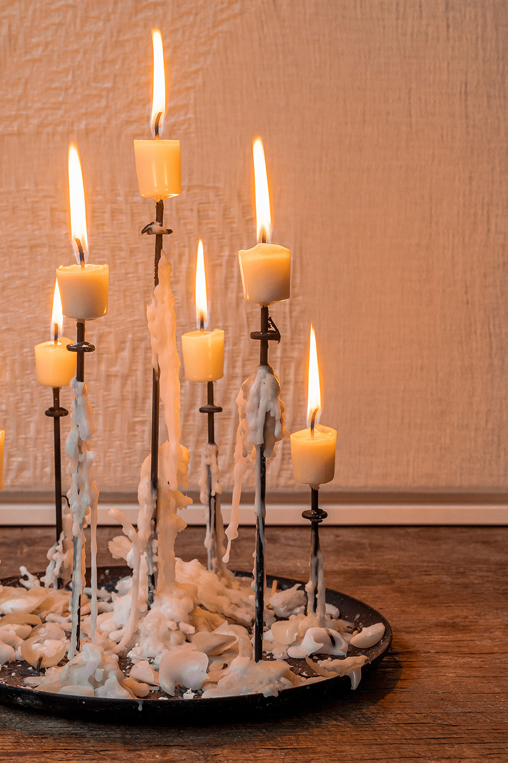 Close-up of the multi-candle pin, showcasing its sturdy construction and modern aesthetic. Provides a secure and stylish solution for grouping candles.
