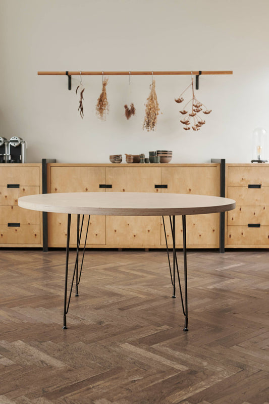 Sputnik Table by Heerenhuis, designed with a thin mat black wireframe and crafted from untreated birch multiplex plywood.