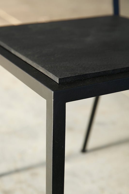 Close-up of the hand-welded metal and rubber seating in the Rubber Chair by Heerenhuis.