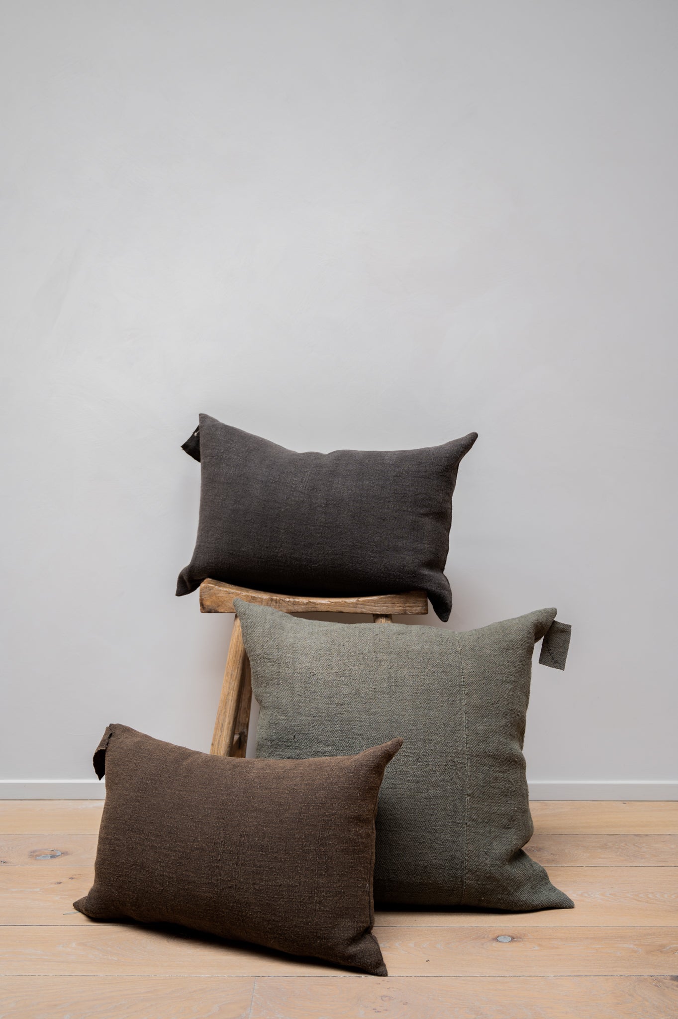 Three linen cushions in different colours by Isabelle Yamamoto