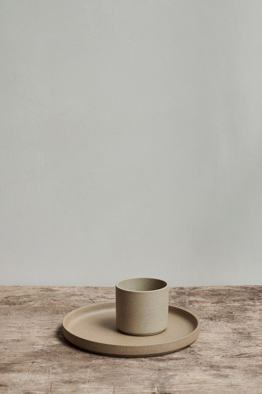 Hasami Porcelain Ceramic Japanese Stackable Plate and Coffee Mug Cup Clay on a rustic wooden table.