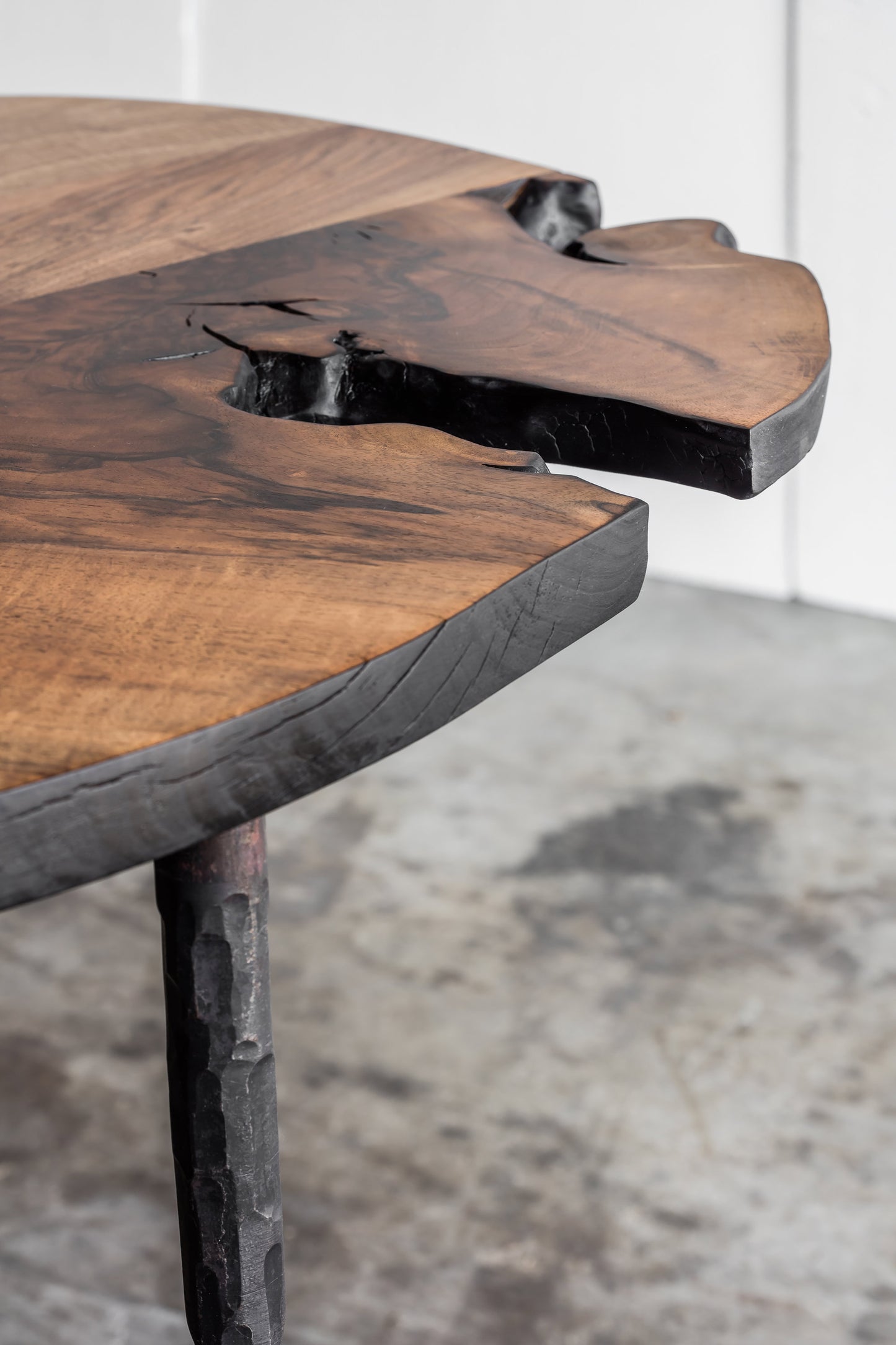 Detail shot of the Heerenhuis Lars Zech Coffee Table - Made from long textured thick walnut wood.
