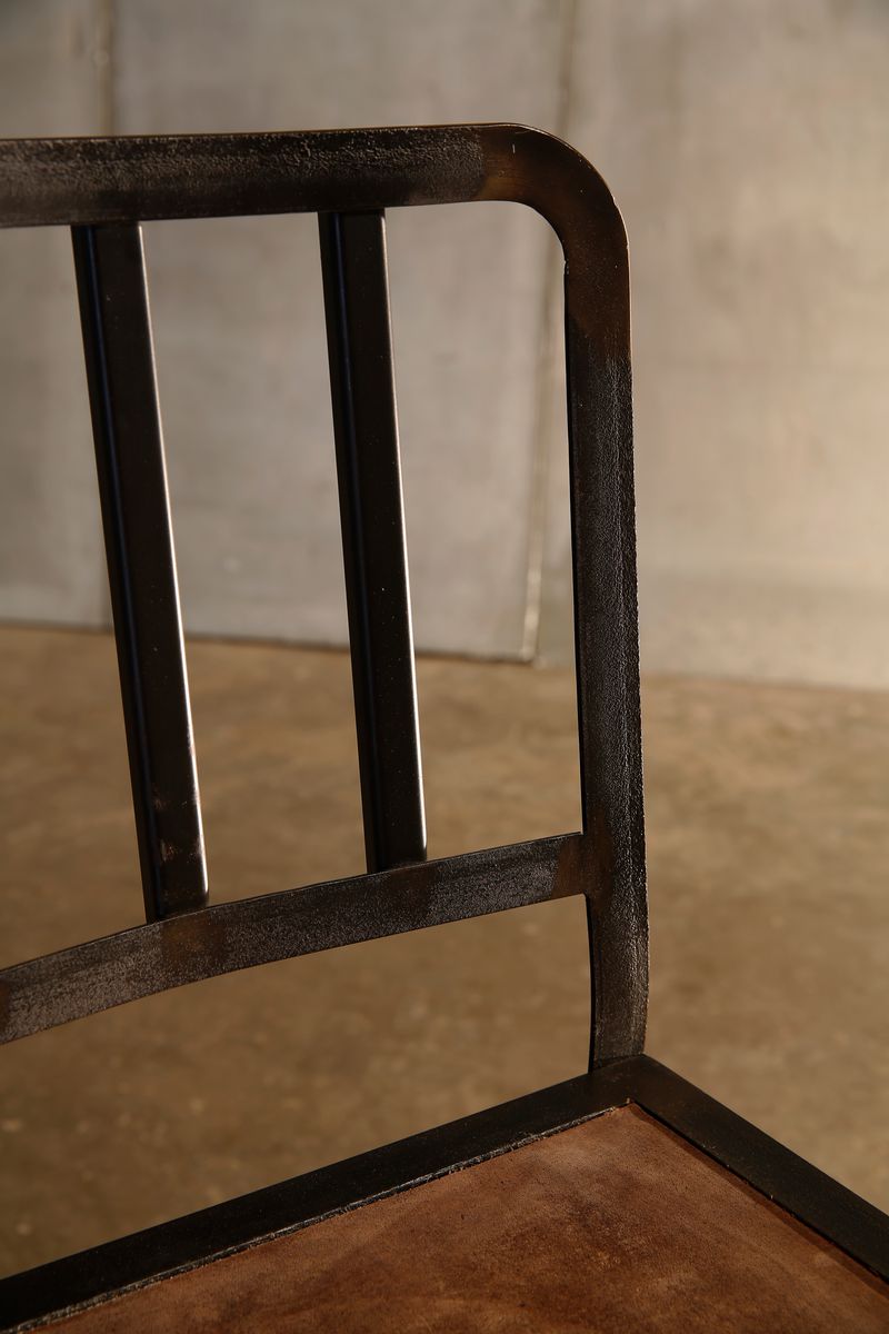 Metal Chair by Heerenhuis handcrafted from metal and oak.