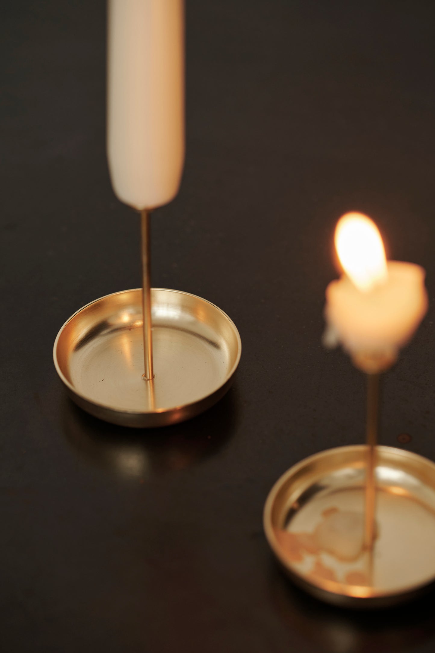 Close-up of the micro candle pin brass, showcasing its intricate design and brass finish. Adds a refined and decorative element to candle displays.