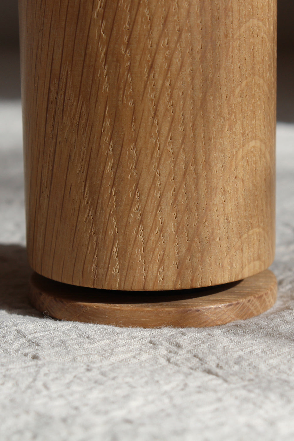 Detail shot of the EKTA Living Crush Me Pepper grinder made from natural oak