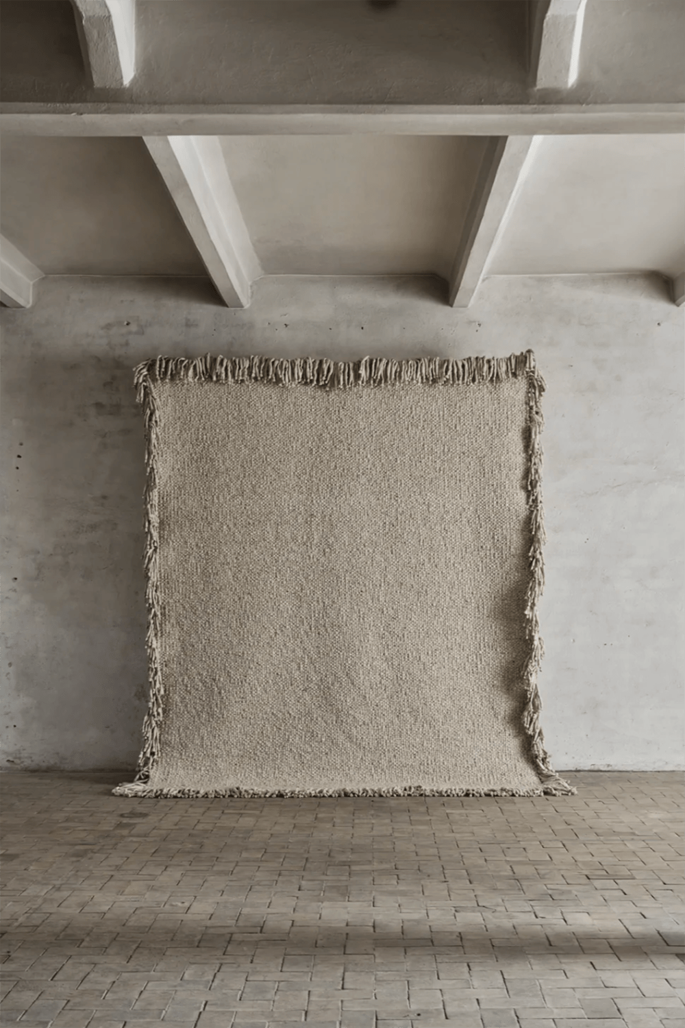 Cappelen Dimyr Handwoven Rug No.12 - big neutral rug hanging on wall