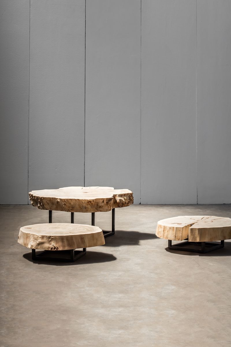 Poplar Coffee Tables by Heerenhuis handcrafted from metal and a single slice of a poplar tree trunk.
