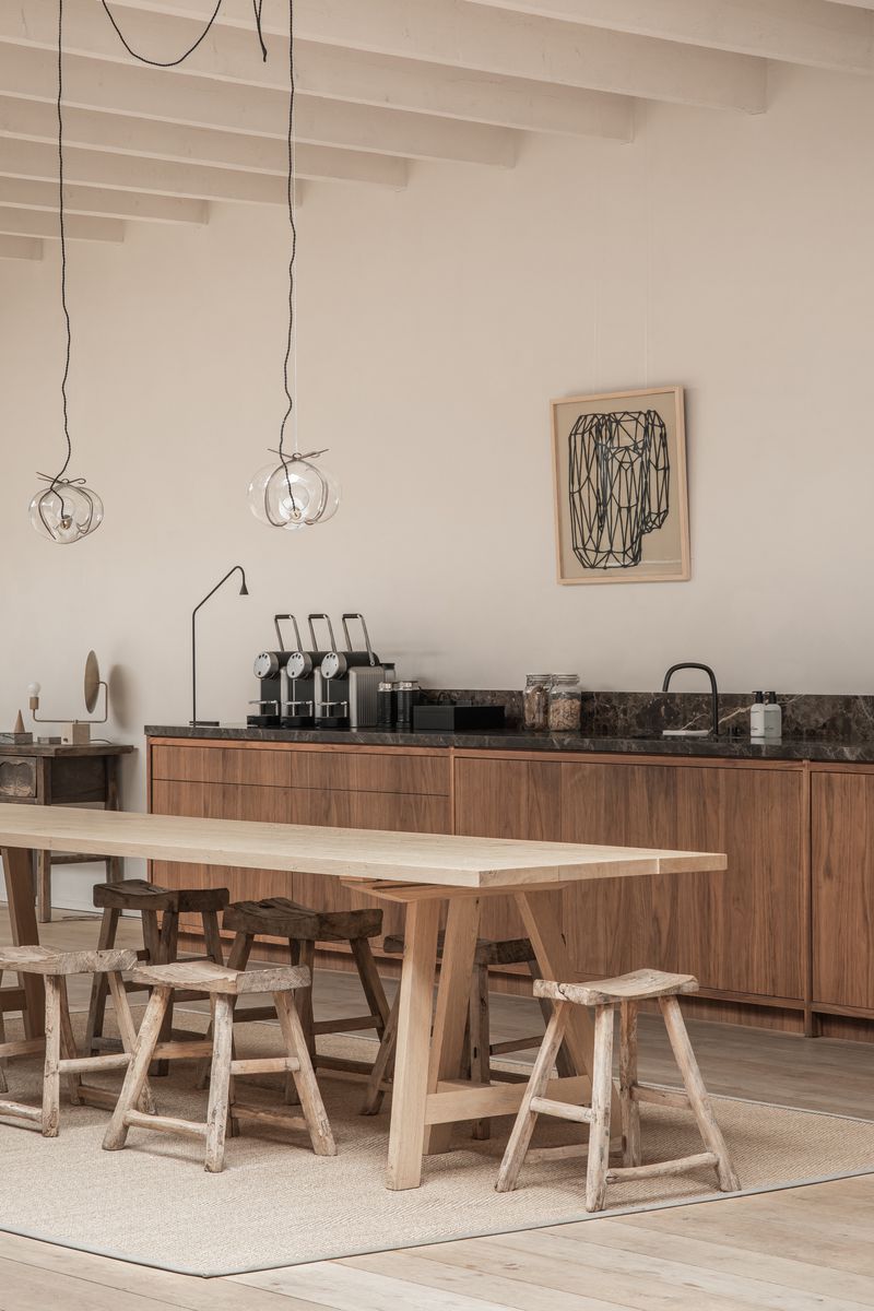 Trestle Table set in an open and airy kitchen interior at Enter The Loft.