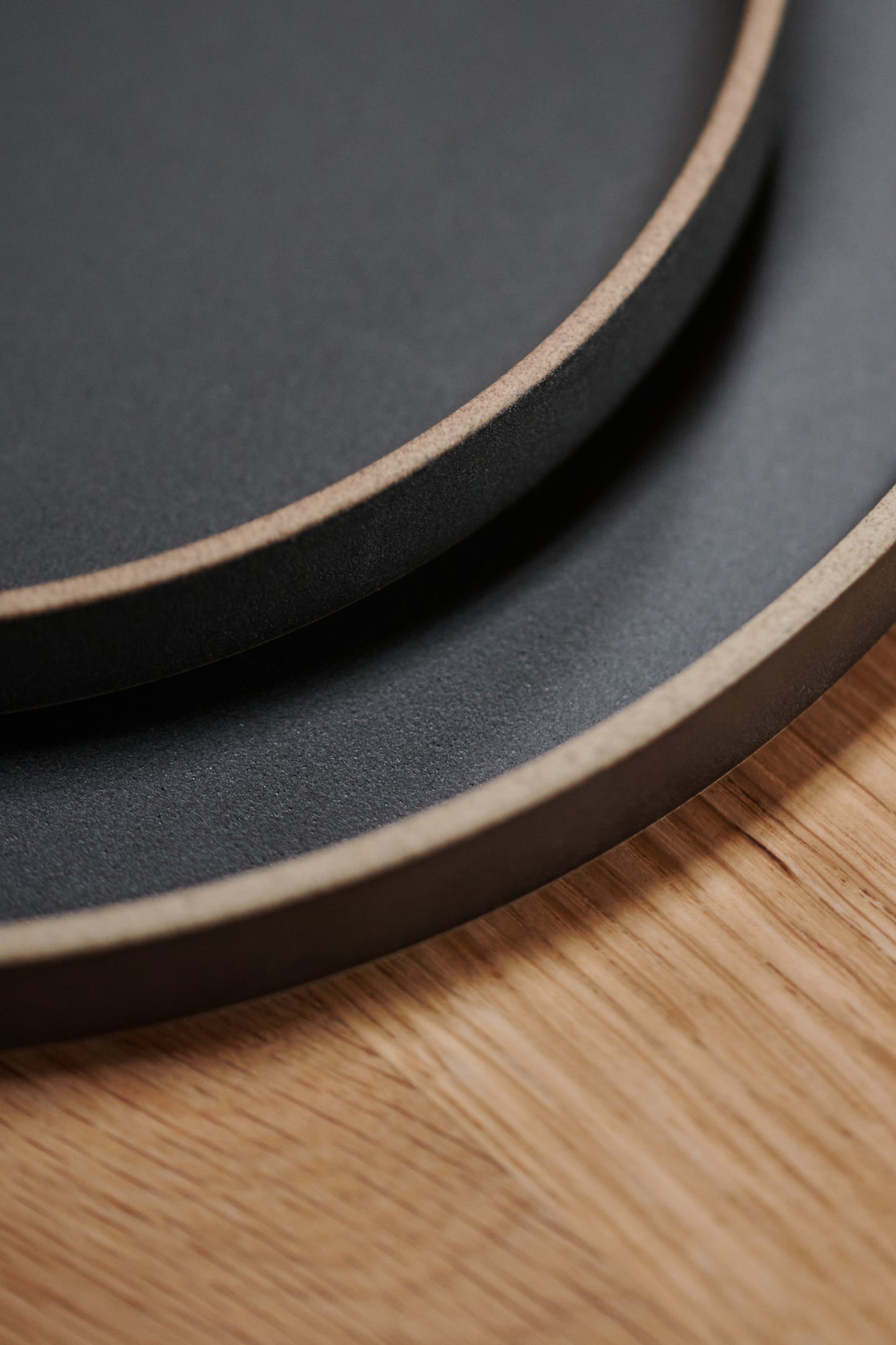 Detail shot of the Black Ceramic Plates by Hasami Porcelain.