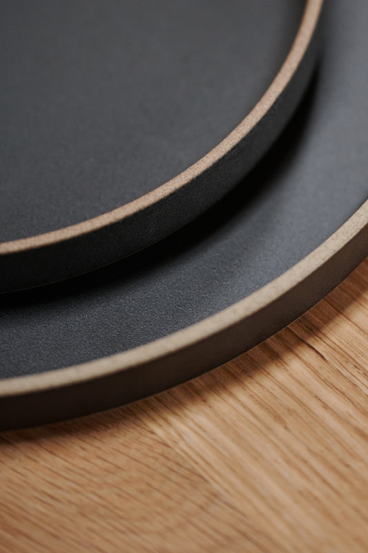 Detail shot of the Black Ceramic Plates by Hasami Porcelain.