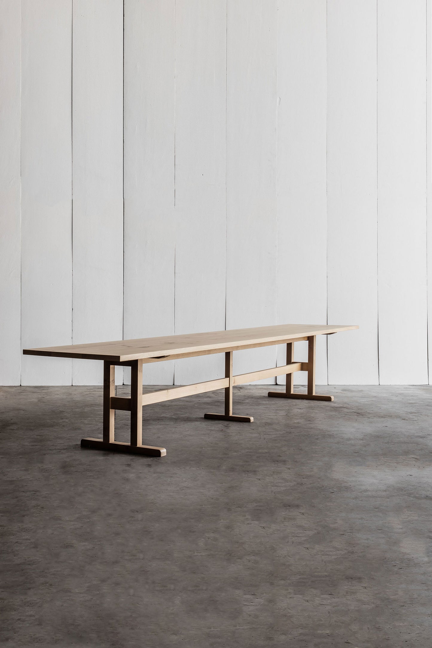 Trappist Table by Heerenhuis handcrafted from thick solid oak with a soft, matte finish.