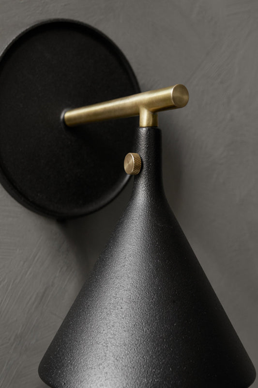 Details of the Black and Gold Cast Sconce Wall Lamp Diffuser, dimmer by Menu.