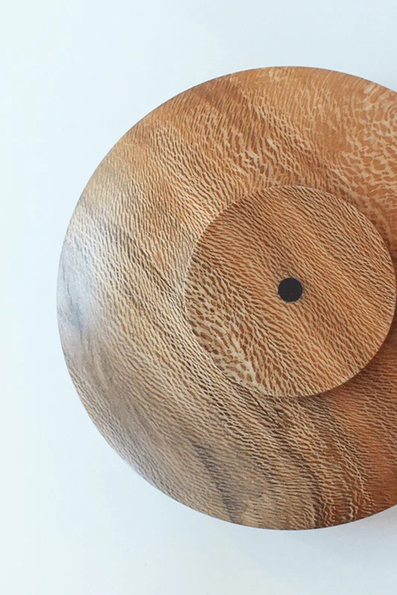Little Bowl Sycamore Wood displayed from a top-down perspective, revealing its size and shape. The W16 x H5 cm dimensions make it a versatile and compact piece for serving and presenting food.
